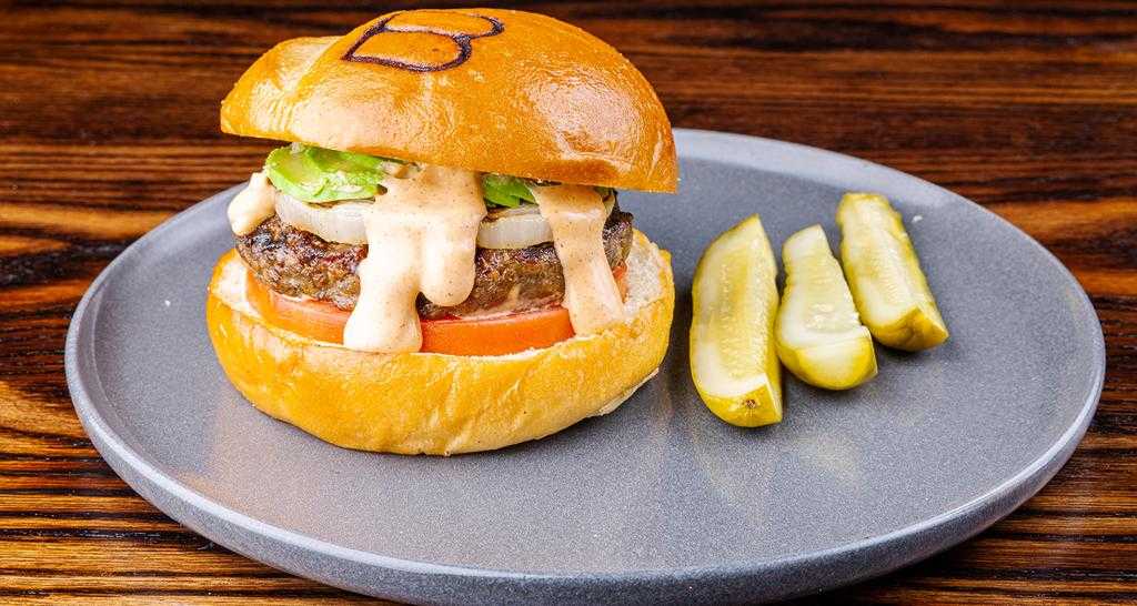 A Barbacoa house burger with fries