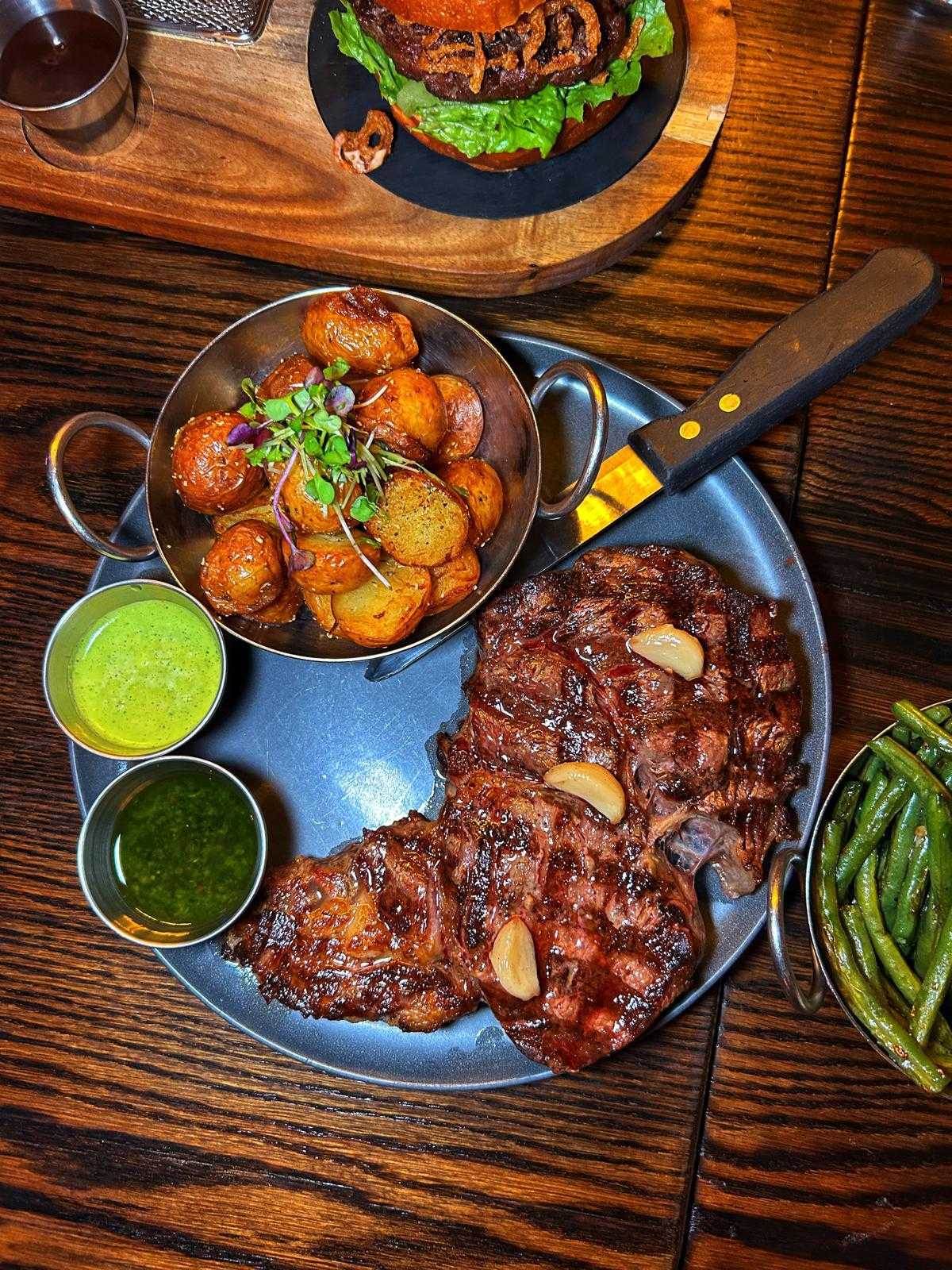 Rib eye with roasted potatoes and string beans